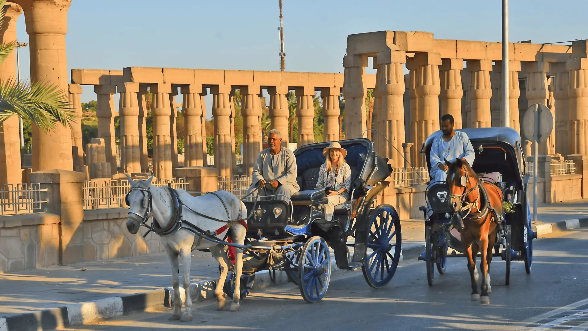 Calèche Ride Luxor | Traditional Horse-Drawn Carriage Experience Enjoying a traditional calèche (horse-drawn carriage) ride through the streets of Luxor, Egypt