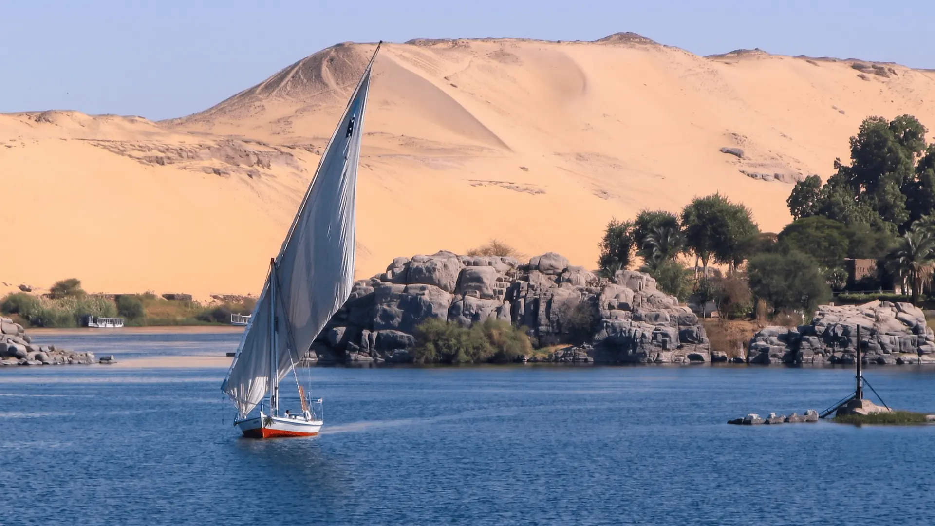 Nile Views from Dahabiya Near Aswan Egypt | Scenic River Cruise Beautiful Nile River landscape viewed from a dahabiya near Aswan during a Nile cruise