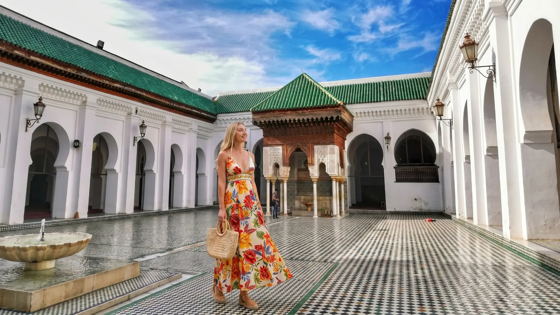 Al-Qarawiyyin Mosque Courtyard Fez | Green Tiles & Historic Architecture Morocco The stunning courtyard of Al-Qarawiyyin Mosque with green tiled roofs and fountain in Fez Morocco