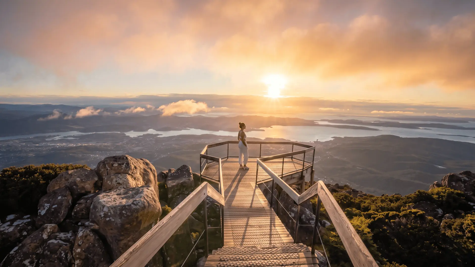 Golden Hour Hike on Mount Wellington Hobart Tasmania Hiking Mount Wellington during golden hour with warm sunset light over Hobart Tasmania