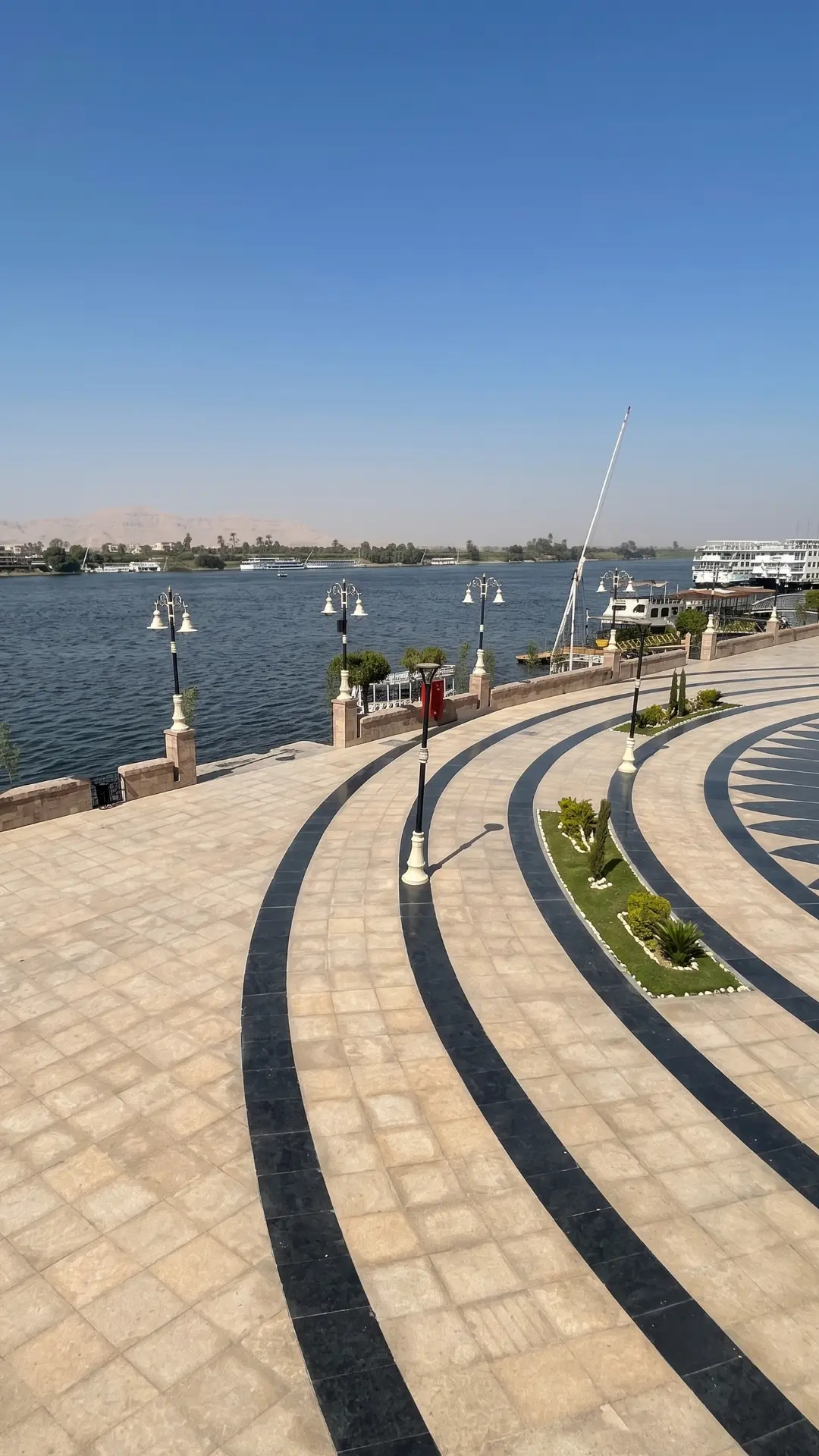 Luxor Corniche Egypt | Scenic Nile Riverfront Promenade The beautiful Corniche of Luxor along the Nile River with views of the east bank