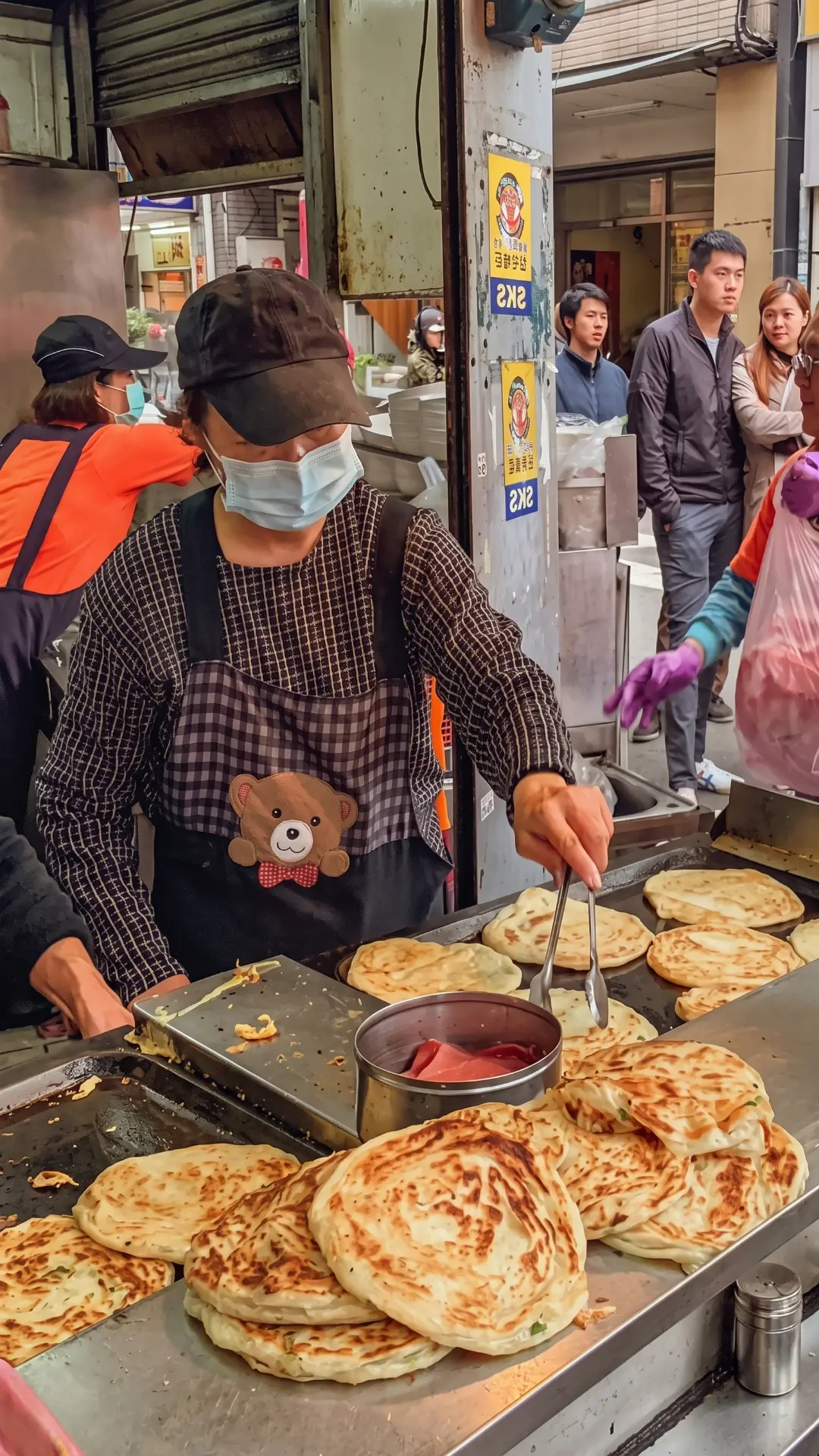 Taiwanese Scallion Pancakes | Crispy Street Food in Taipei Freshly made golden Taiwanese scallion pancakes (cong you bing) with crispy layers and green onions